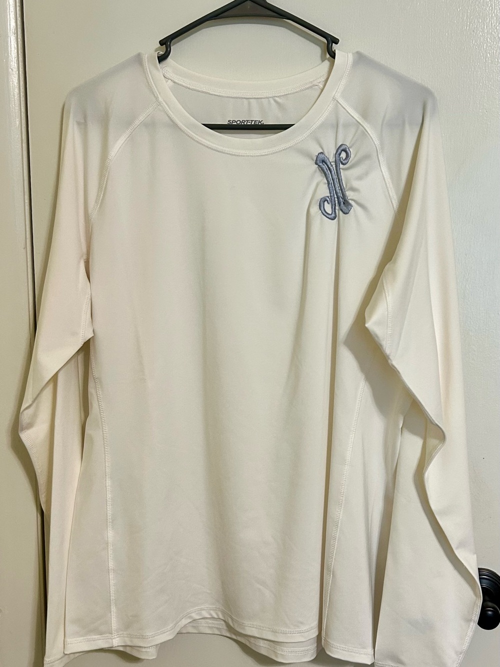 Sport-Tek Women's Cream White. Long-Sleeve Performance Top Monogrammed N